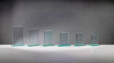 Sechs unterschiedlich hohe Rechtecke aus Klarglas, 117x100 mm bis 220x140 mm, aufrecht stehend und für Lasergravur geeignet. Awards Bielefeld 6-er Serie von POMEKI.